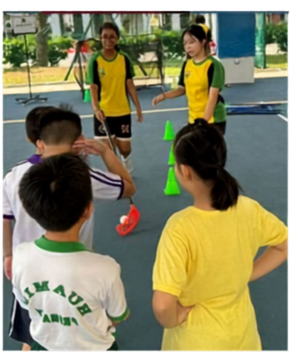 Secondary 3 Students briefing participants from Vibrate @ Yishun (CDAC) on game rules for this station.
